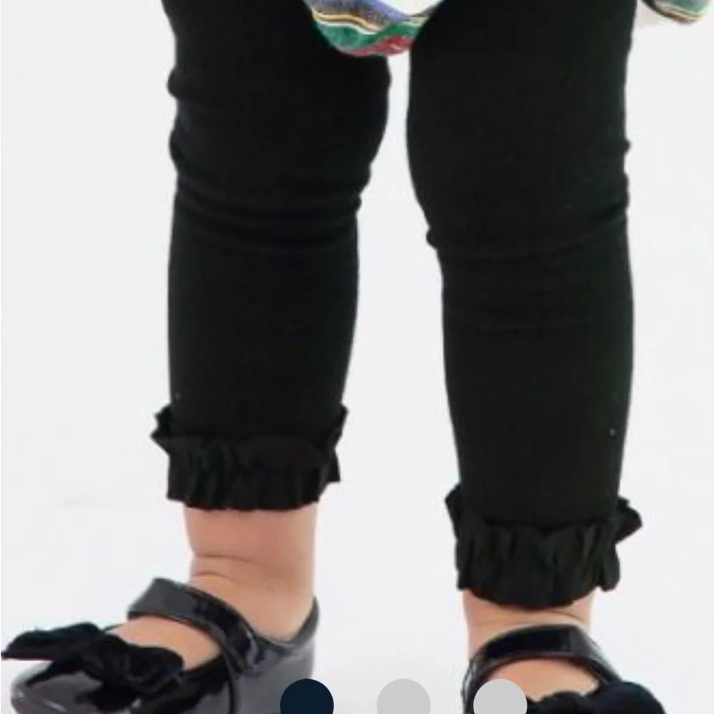 Ruffle Butts chic black